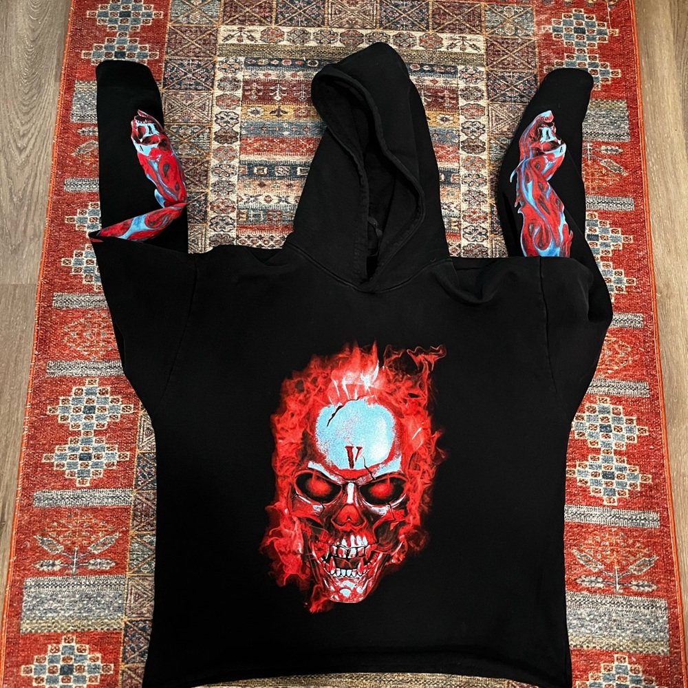Black Hoodie with Red Skull Design